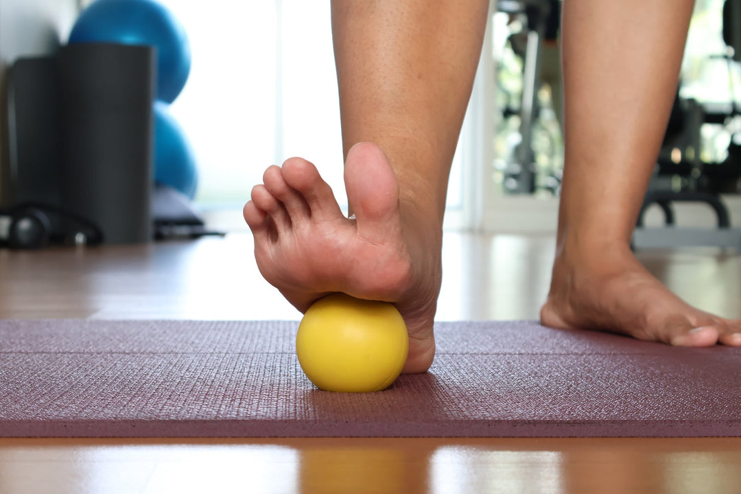Ball roll massage for feet.