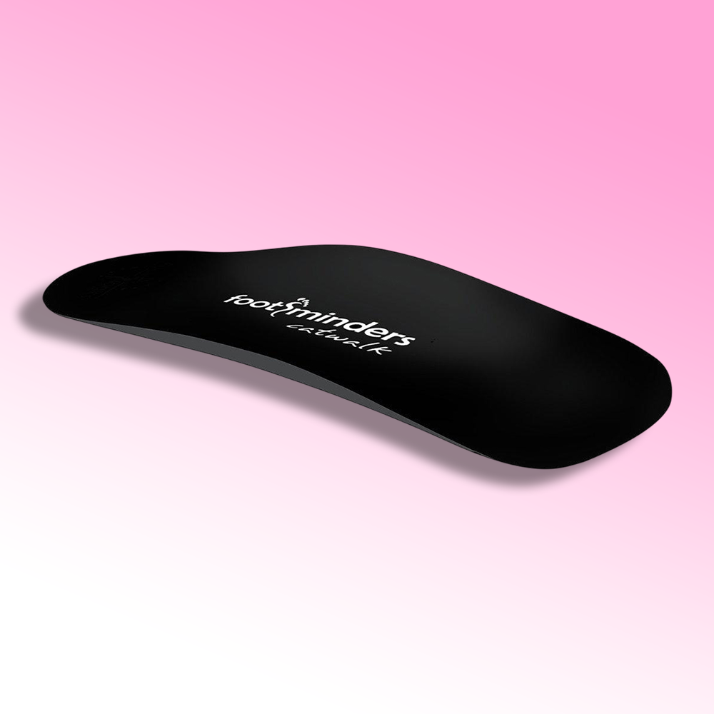 Black shoe insole with 'footfinders' branding on a pink background