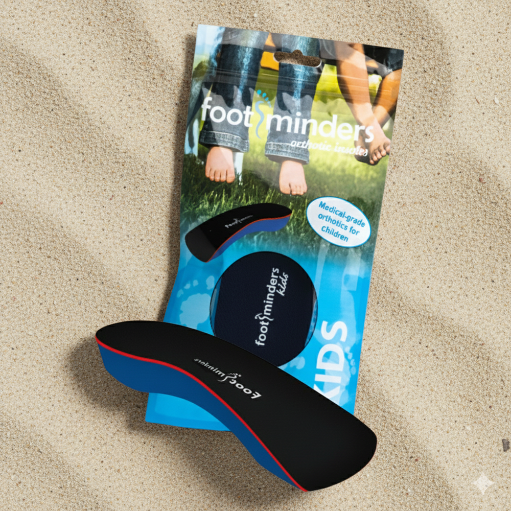 Black orthopedic insole with blue packaging labeled 'foot minders' on a beige surface.