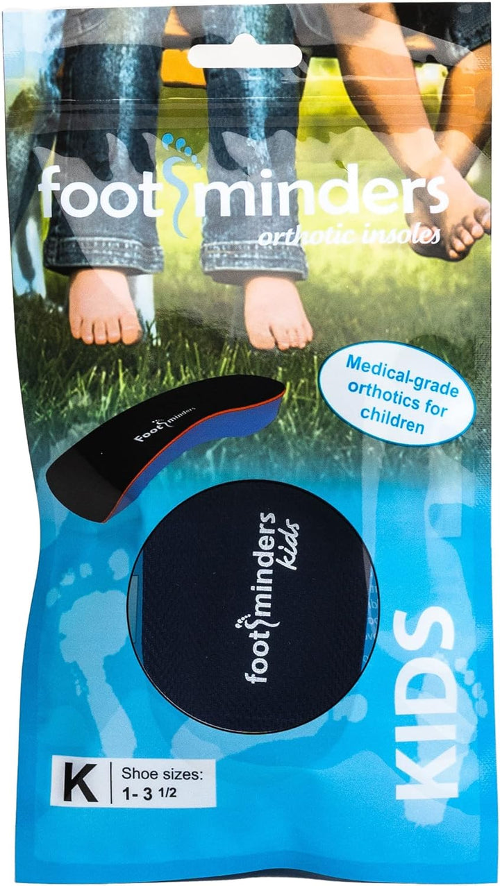 Package of 'foot minders' orthotic inserts for children with a child's feet on grass in the background.